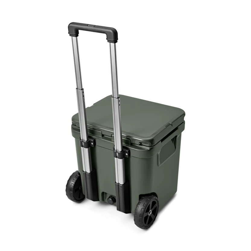 YETI Roadie 48 Wheeled Cool Box in Camp Green with handle extended
